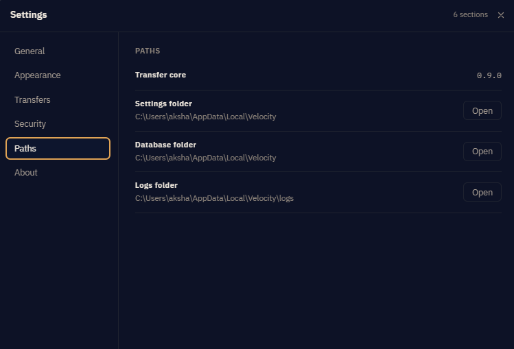 Settings, Paths section, showing the transfer core version and the settings, database and logs folders, each with an Open button.